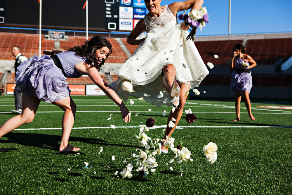 Kicking the Bouquet - The flower petals go flying as the bride uses her Manolo Blahnik luxury wedding shoes to kick a field goal with her bouquet